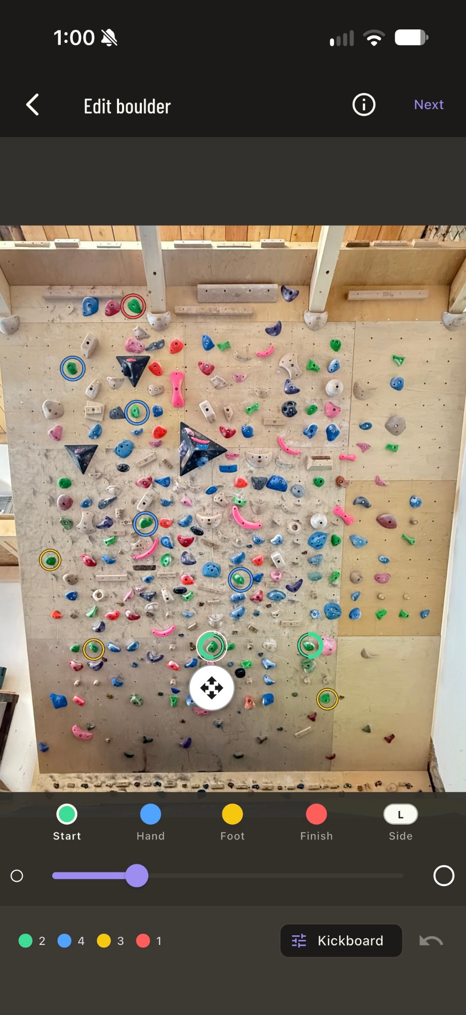 The editor: holds circled in green, blue, yellow and red on a wall photo
